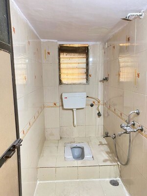 Bathroom in 2 BHK Apartment at Raghunath Vihar CHS, Seawoods West – for Rent