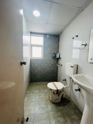 Bathroom in 3 BHK Apartment at Adore Happy Homes, Sector 86 – for Sale