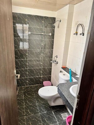 Bathroom in 3 BHK Apartment at Adore Happy Homes, Sector 86 – for Sale