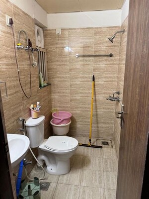 Bathroom in 3 BHK Apartment at Adore Happy Homes, Sector 86 – for Sale