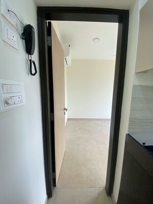 Building Lobby in 1.5 BHK Apartment at Kalpataru Elitus, Mulund West – for Rent