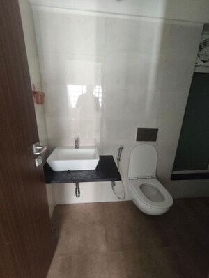Bathroom in 2 BHK Apartment at Alliance Abhimanyu, Malad West – for Rent