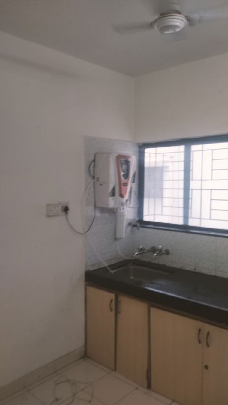 Kitchen, oxford-comforts 2 Bedroom 850 Sq.Ft. Apartment In Wanwadi Pune 10780958