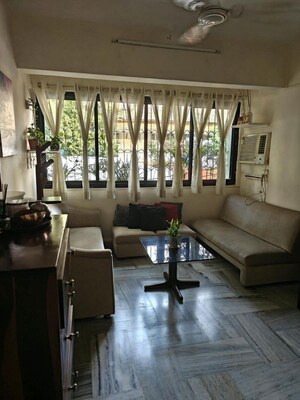 Living Room in 1 BHK Apartment at Bandra West – for Rent