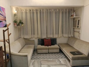 Living Room in 1 BHK Apartment at Bandra West – for Rent
