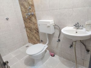 Bathroom in 2 BHK Apartment at Maa Karnikripa Homes, Gandhi Path – for Rent