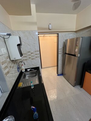Kitchen in 2 BHK Apartment at The Baya Goldspot, Andheri East – for Rent