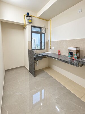 Kitchen in 2 BHK Apartment at Piramal Vaikunth, Balkum Pada – for Rent