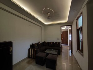 Living Room in 1.5 BHK Apartment at Freedom Fighters Enclave – for Rent