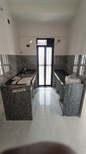 Kitchen in 1 BHK Apartment at Paradigm Antalya, Oshiwara – for Rent