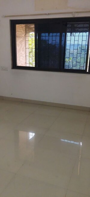 Room in 2 BHK Apartment at Nerul Sector 19 – for Rent