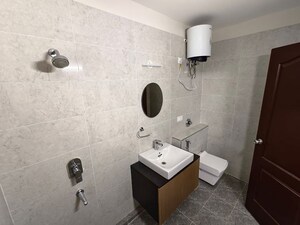 Bathroom in 4 BHK Apartment at Sjr Primecorp Vogue Residences, Whitefield – for Rent