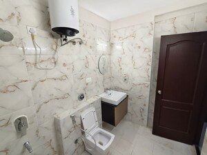 Bathroom in 4 BHK Apartment at Sjr Primecorp Vogue Residences, Whitefield – for Rent