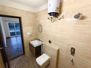 Bathroom in 4 BHK Apartment at Sjr Primecorp Vogue Residences, Whitefield – for Rent