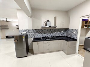 Kitchen in 4 BHK Apartment at Sjr Primecorp Vogue Residences, Whitefield – for Rent