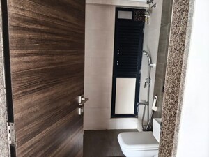 Building Lobby in 2 BHK Apartment at Kanakia Rainforest, Andheri East – for Rent