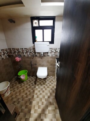Bathroom in 2 BHK Apartment at Kanakia Spaces Niharika, Manpada – for Rent