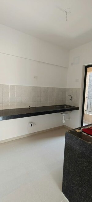 Kitchen in 2 BHK Apartment at Shapoorji Pallonji Joyville Hadapsar Annexe, Hadapsar – for Rent