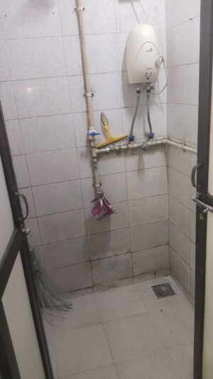 Bathroom in 1 BHK Apartment at Omkar SRA, Malad East – for Rent