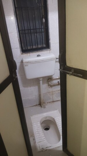 Bathroom in 1 BHK Apartment at Omkar SRA, Malad East – for Rent