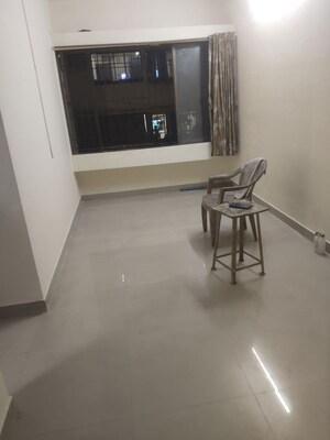 Living Room in 1 BHK Apartment at Omkar SRA, Malad East – for Rent