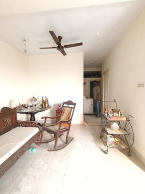 Living Room in 2 BHK Apartment at Raj Sarita CHS, Dahisar East – for Sale