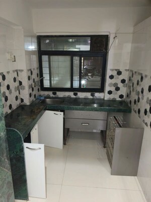 Kitchen in 1 BHK Apartment at RNA NG Regency Phase I, Balkum Pada – for Rent