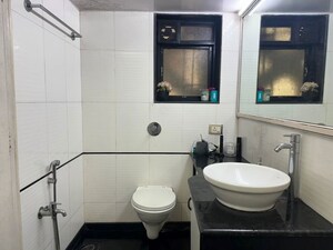 Bathroom in 2 BHK Apartment at Prasad Prakalp Apartments, Khar West – for Sale