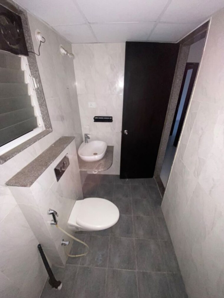 Bathroom, kolte-patil-western-avenue 2 Bedroom 664 Sq.Ft. Apartment In Wakad Pune 10781633