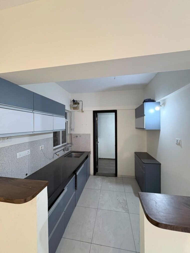 Kitchen, kolte-patil-western-avenue 2 Bedroom 664 Sq.Ft. Apartment In Wakad Pune 10781633