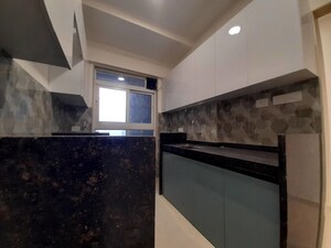 Kitchen in 2 BHK Apartment at Group Satellite Elegance, Goregaon East – for Rent