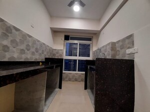 Kitchen in 1 BHK Apartment at Group Satellite Elegance, Goregaon East – for Rent