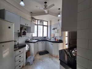 Kitchen in 2.5 BHK Apartment at Malibu Town – for Sale