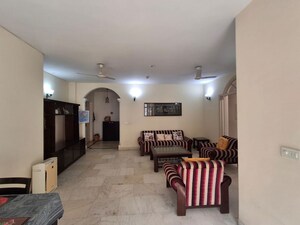 Living Room in 2.5 BHK Apartment at Malibu Town – for Sale