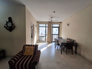 Living Room in 2.5 BHK Apartment at Malibu Town – for Sale