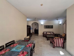 Living Room in 2.5 BHK Apartment at Malibu Town – for Sale