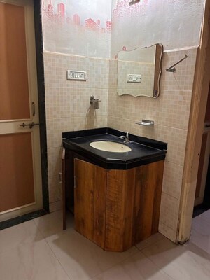Kitchen in 3 BHK Apartment at Daffodils Housing Society Row House, Pimple Saudagar – for Sale