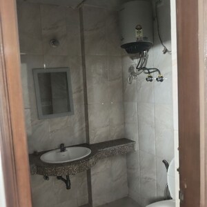 Bathroom in 3 BHK Apartment at Viman Cooperative Housing Society, Sector 9a – for Rent