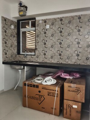 Kitchen in 1 BHK Apartment at Atmiya Centria, Santacruz East – for Rent