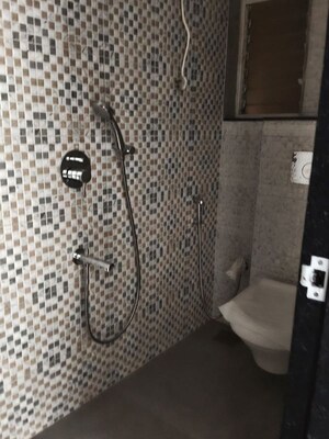 Bathroom in 1 BHK Apartment at Atmiya Centria, Santacruz East – for Rent