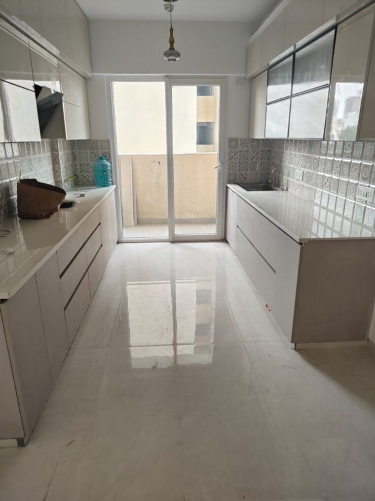 Kitchen, tulip-yellow 3 Bedroom 1704 Sq.Ft. Apartment In Sector 69 Gurgaon 10781842