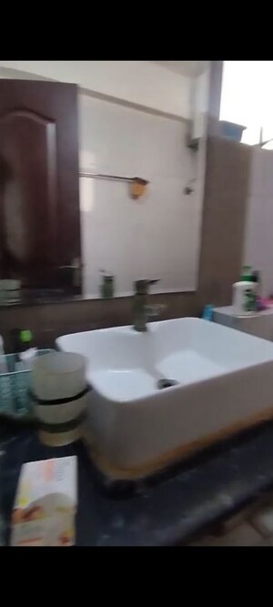 Bathroom in 2.5 BHK Apartment at Sikka Karmic Greens, Sector 78 – for Rent