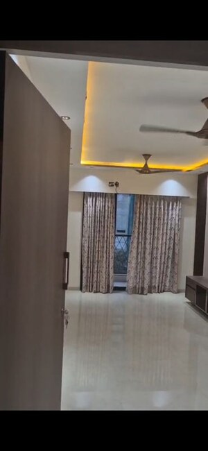Living Room in 2 BHK Apartment at Modirealty Vatvriksh, Goregaon West – for Rent