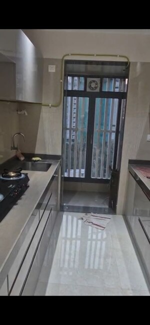Kitchen in 2 BHK Apartment at Modirealty Vatvriksh, Goregaon West – for Rent