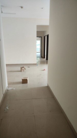 Building Lobby in 3 BHK Apartment at Unitech Uniworld Gardens 2, Sector 47 – for Rent