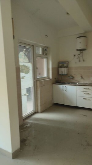 Kitchen in 3 BHK Apartment at Unitech Uniworld Gardens 2, Sector 47 – for Rent