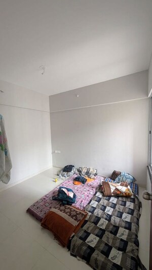 Bedroom in 2 BHK Apartment at Mangalam Life Park, Dudulgaon – for Rent