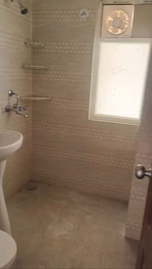 Bathroom in 2.5 BHK Apartment at Charms Castle, Raj Nagar Extension – for Rent