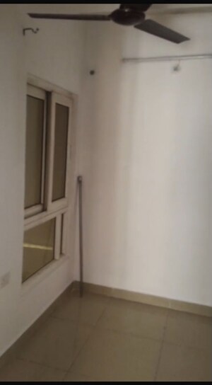 Room in 2.5 BHK Apartment at Charms Castle, Raj Nagar Extension – for Rent