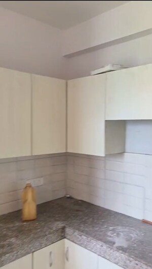 Kitchen in 2.5 BHK Apartment at Charms Castle, Raj Nagar Extension – for Rent